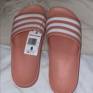 Adidas slides.